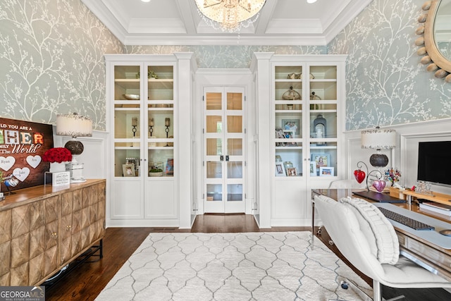 office area with dark wood-type flooring, ornamental molding, coffered ceiling, and a chandelier