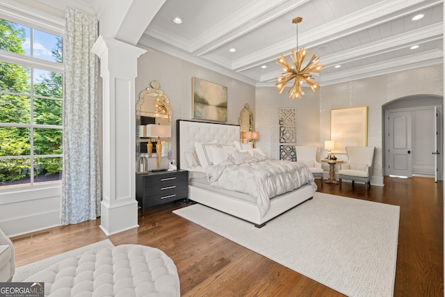 bedroom with ornamental molding, beam ceiling, dark hardwood / wood-style flooring, and ornate columns