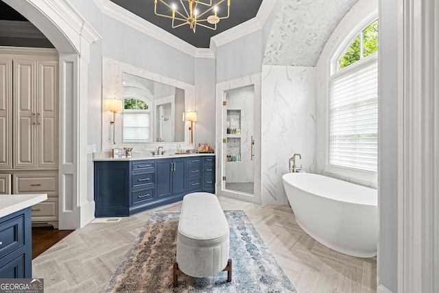 full bath with a soaking tub, an inviting chandelier, crown molding, vanity, and a shower stall