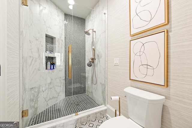 bathroom with an enclosed shower and toilet