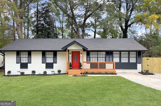 ranch-style house with a front lawn