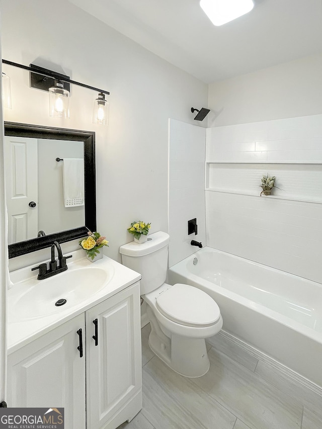 full bathroom with vanity, toilet, and shower / tub combination