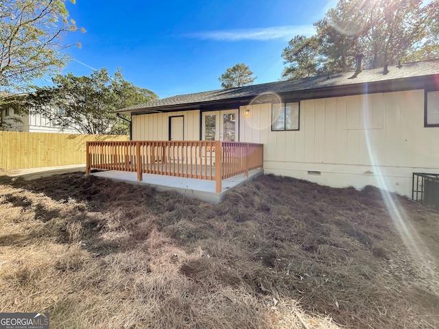 view of front of property featuring a wooden deck