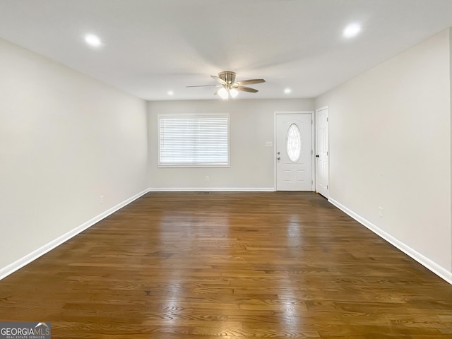 entrance foyer with dark hardwood / wood-style floors and ceiling fan