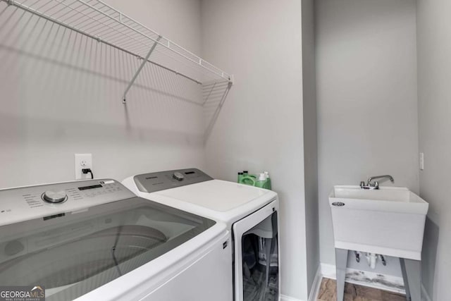 laundry area with washer and clothes dryer