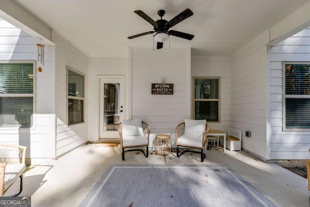 view of patio / terrace featuring ceiling fan