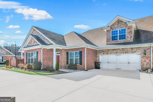 view of front of property featuring a garage