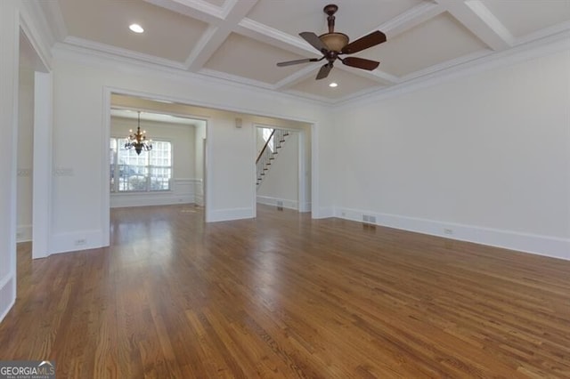 unfurnished room with coffered ceiling, ornamental molding, dark hardwood / wood-style floors, beam ceiling, and ceiling fan with notable chandelier