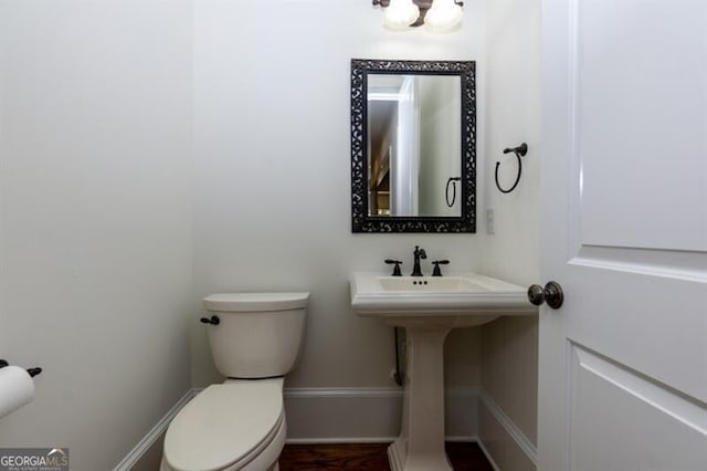 bathroom featuring toilet