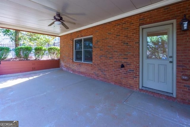 view of patio / terrace featuring ceiling fan