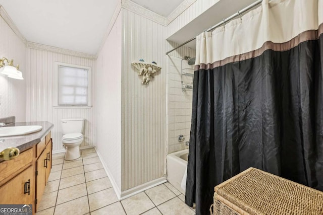 full bathroom featuring toilet, crown molding, vanity, shower / bath combo with shower curtain, and tile patterned flooring