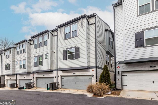 view of front of home featuring central AC unit