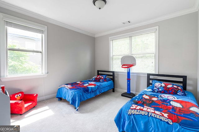 carpeted bedroom with ornamental molding