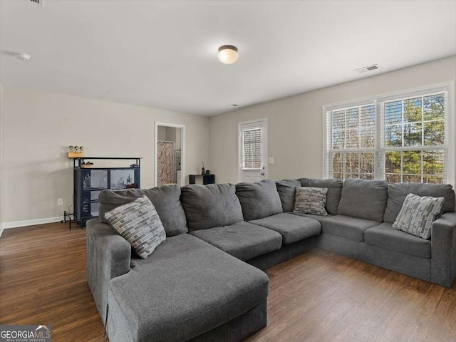 living room featuring dark hardwood / wood-style flooring