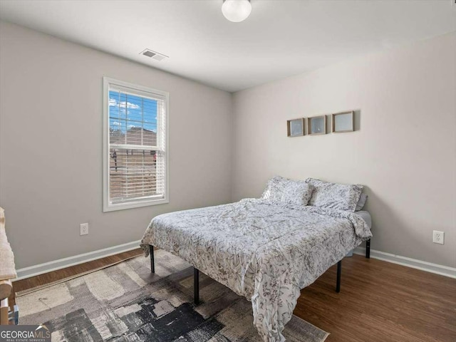 bedroom featuring hardwood / wood-style flooring