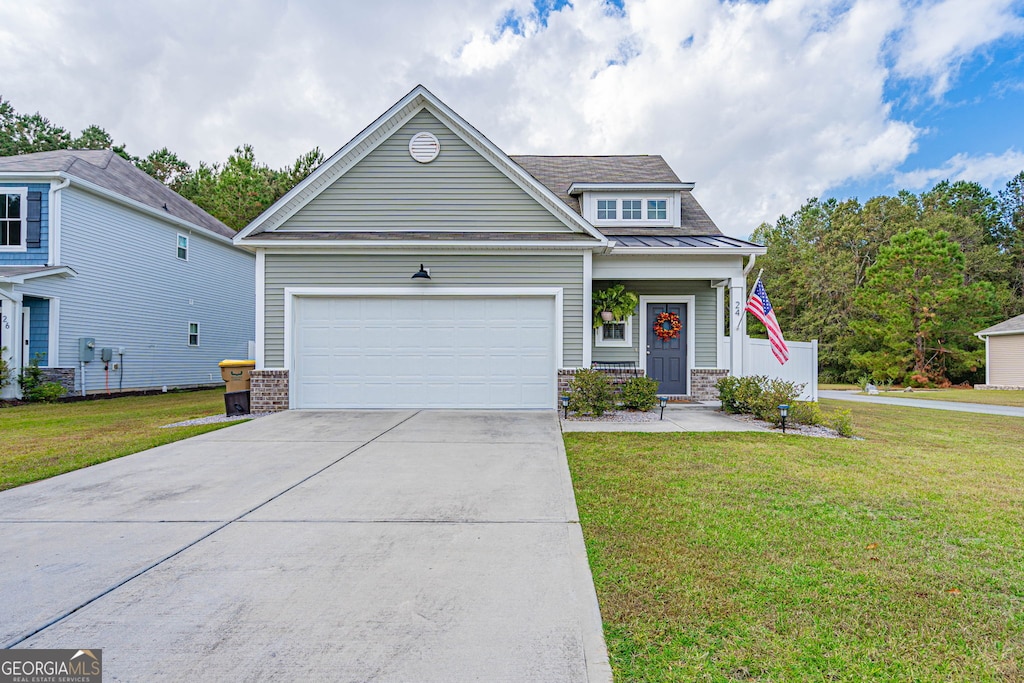 view of front of house featuring a garage, covered porch, and a front yard