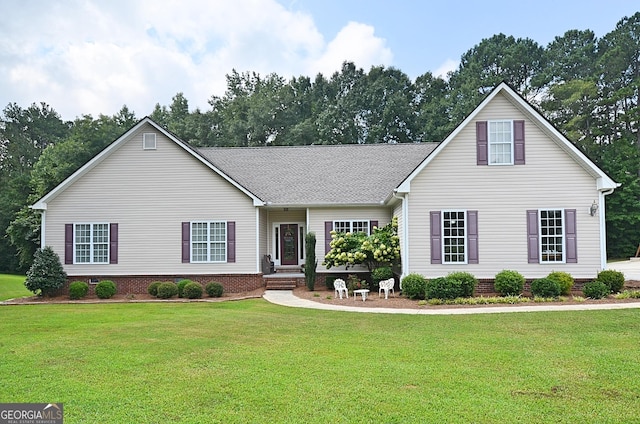 view of front of home with a front lawn