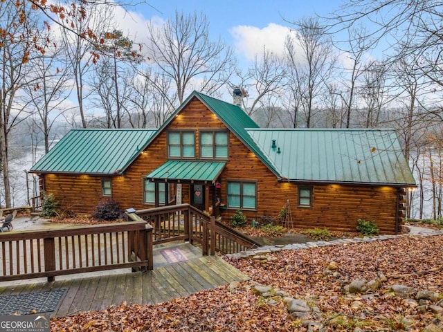 rear view of house with a deck