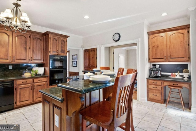 kitchen with a kitchen breakfast bar, a center island, a notable chandelier, black appliances, and crown molding