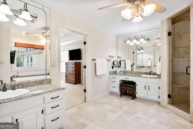 bathroom with ornamental molding, vanity, ceiling fan, and walk in shower