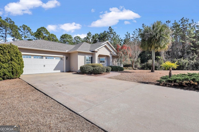 ranch-style home featuring a garage