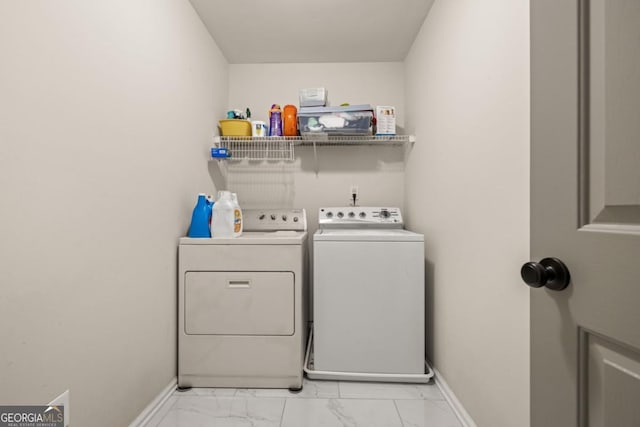 laundry area with independent washer and dryer