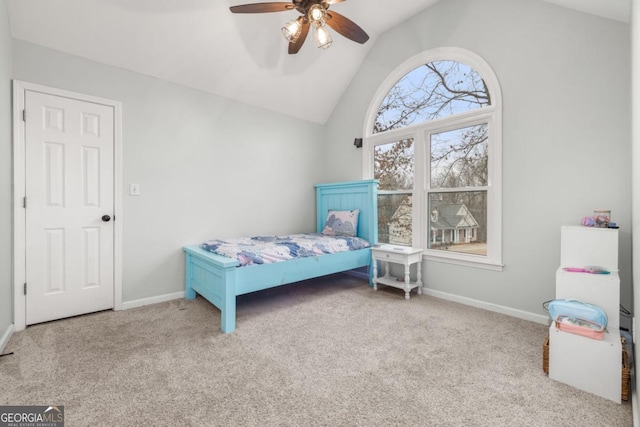 bedroom featuring lofted ceiling, light carpet, and ceiling fan