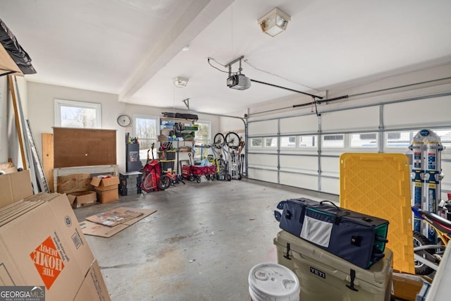 garage featuring a garage door opener