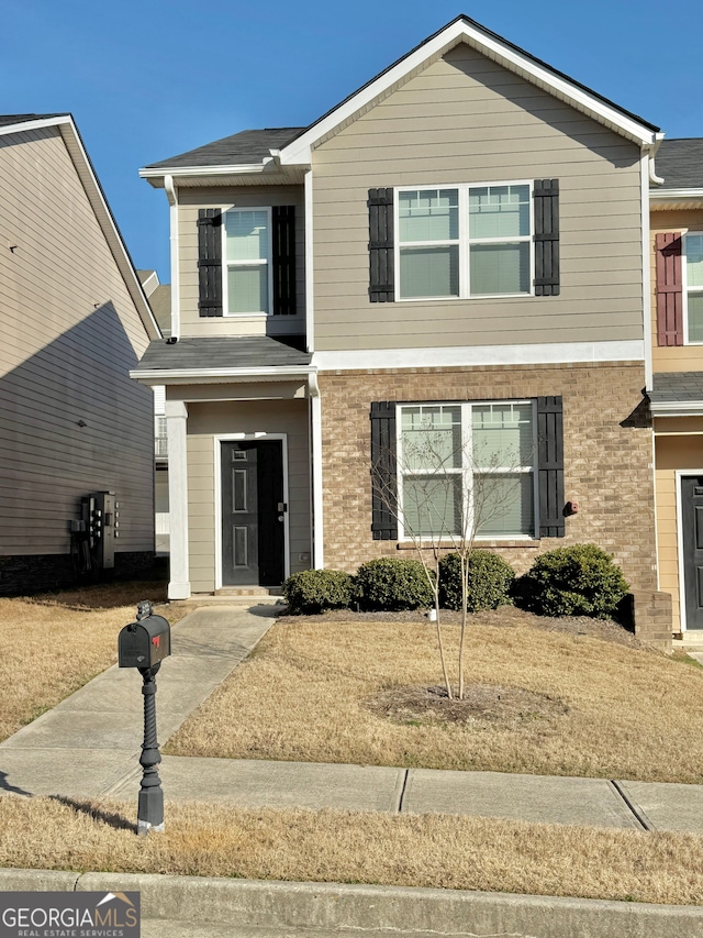 view of front of house with a front lawn