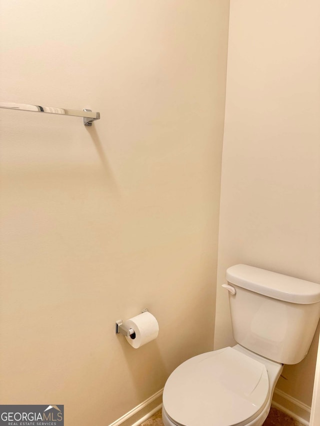 bathroom featuring toilet