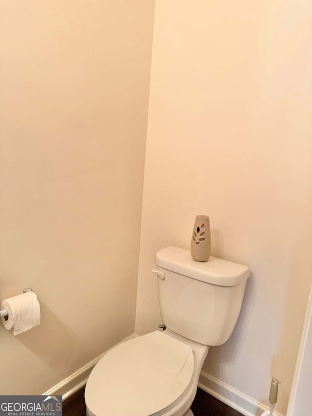 bathroom featuring toilet