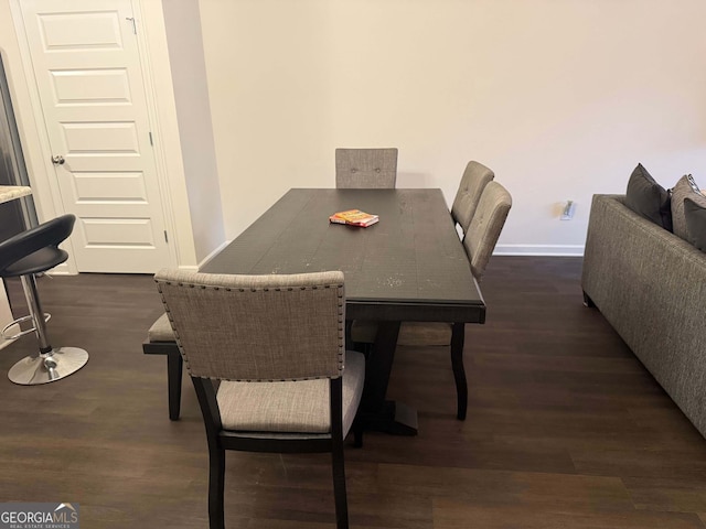 dining room featuring dark hardwood / wood-style floors