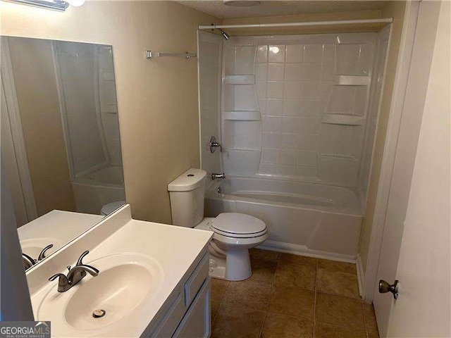 full bathroom featuring vanity, bathtub / shower combination, tile patterned floors, and toilet