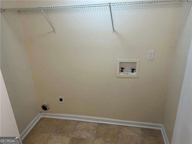 washroom with hookup for an electric dryer and hookup for a washing machine