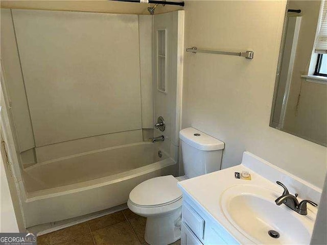 full bathroom featuring tile patterned floors, toilet, shower / bathing tub combination, and vanity