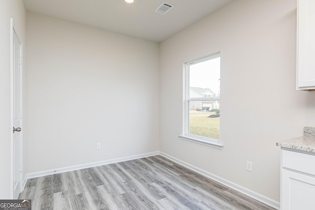 empty room featuring light hardwood / wood-style floors