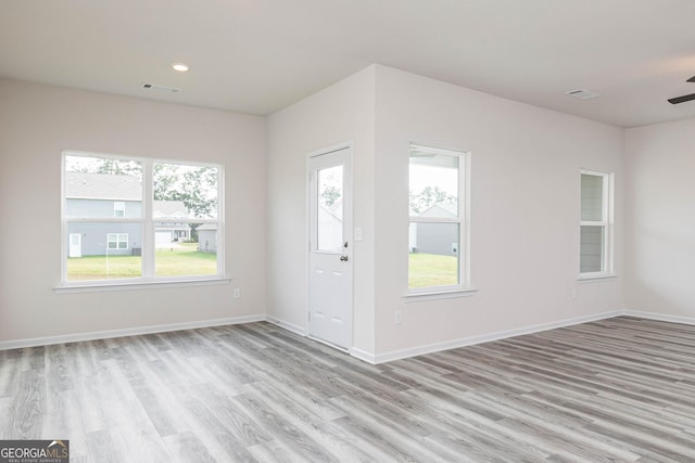 entryway with light hardwood / wood-style flooring