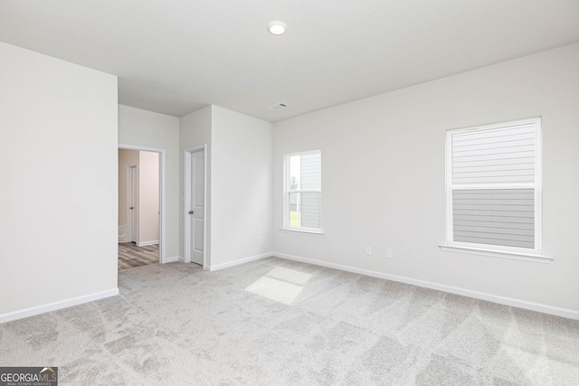 view of carpeted spare room