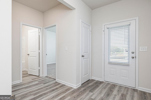 foyer featuring light wood-type flooring