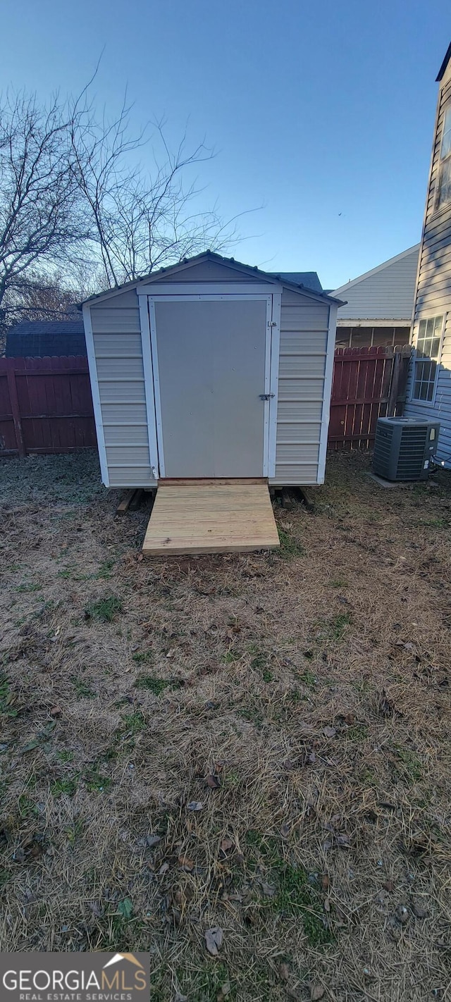 view of outbuilding with central AC unit