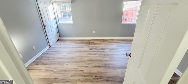 interior space featuring a wealth of natural light and light wood-type flooring