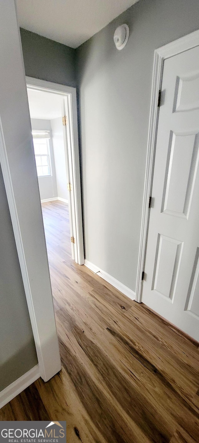 hallway featuring hardwood / wood-style floors