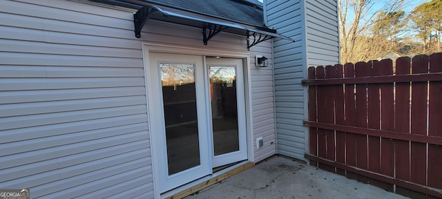 doorway to property with a patio area