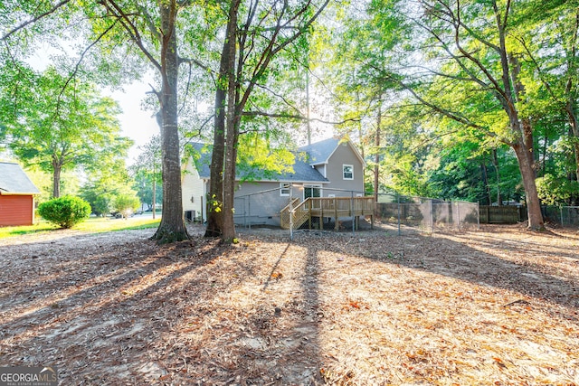 exterior space featuring a wooden deck