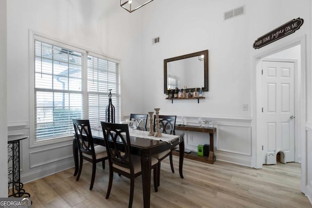 dining room with light wood-type flooring