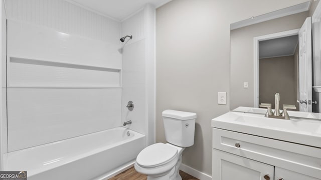 full bathroom featuring shower / bathtub combination, vanity, toilet, and hardwood / wood-style floors