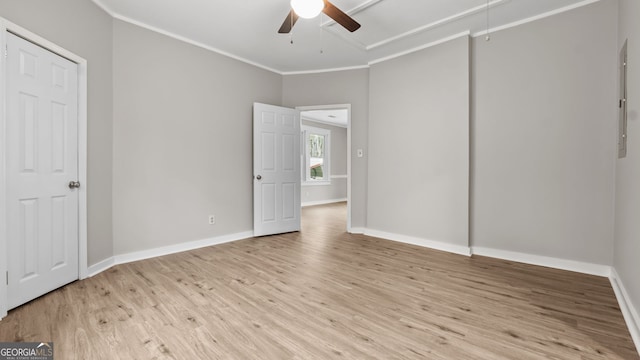 unfurnished bedroom with ornamental molding, ceiling fan, and light hardwood / wood-style floors