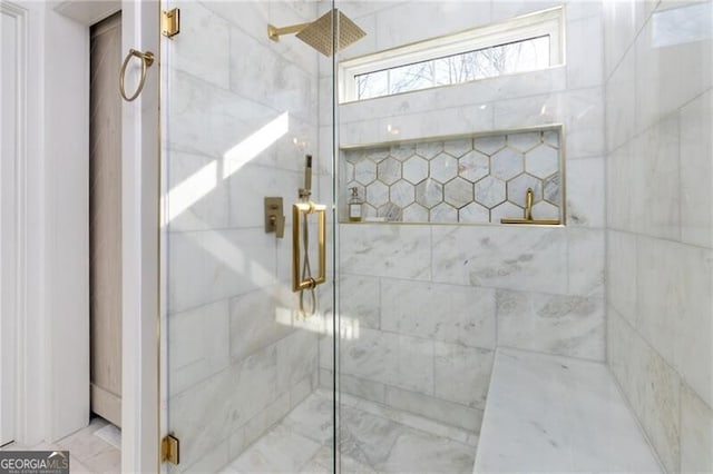 bathroom with an enclosed shower