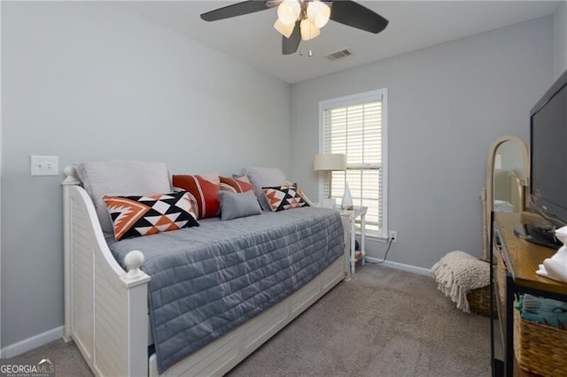 bedroom with light colored carpet and ceiling fan