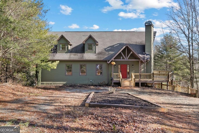 view of front of property featuring a wooden deck